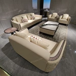 Cream Leather Sofa Set with Wave Quilted Craftsmanship, Natural Wood Veneer & Embroidered Wing Logo Accents